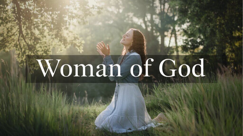 Woman of God kneeling in a field surrounded by trees and grass with her hands raised in praise